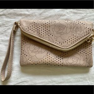 Beige faux leather wristlet with rose accents